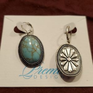 Silver tone fashion earrings reversible